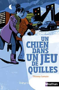 Un chien dans un jeu de quilles